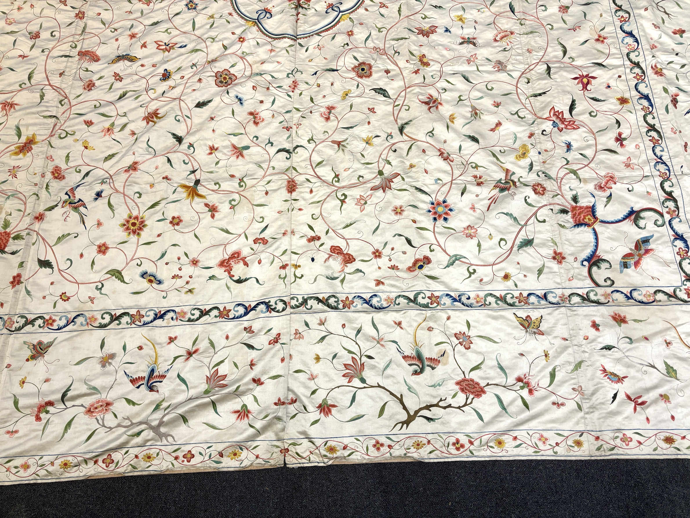 A fine Chinese 19th century silk polychrome embroidered cream silk bed cover, 290cm long x 278cm wide (both curtains together)